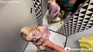Oh man, my blonde gf with glasses and lipstick gets on her knees for a homemade blowjob in the shop changing booth, sucking my tattooed cock until cumshot! 😏🍆💦