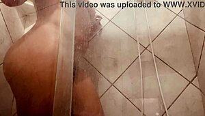Why is this girl showing off her hairy pussy while being filmed in the shower?