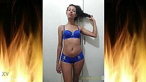Beautiful brunette poses in blue lingerie for trailer 01