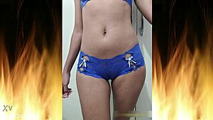 Beautiful brunette poses in blue lingerie for trailer 01