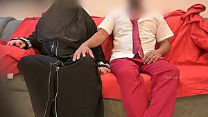 In the quiet classroom, the Muslim lady teacher reached out and began playing with her student's throbbing dick, her hands exploring every inch.