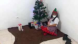 This mature student unwraps her Christmas gifts and enjoys masturbating with a dildo under spotlights in her uniform.