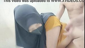 Aku istri berjilbab enjoys quality time with a companion while husband is at work in this amateur housewife scenario