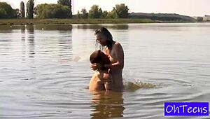 In a sunny outdoor setting, Erika and Karol showcase their big natural tits in this free European amateur video.