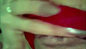 Rossmexicana indulges in solo masturbation with her dildo while wearing those sexy red stockings for ultimate pleasure.