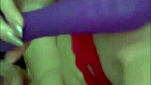 Rossmexicana indulges in solo masturbation with her dildo while wearing those sexy red stockings for ultimate pleasure.