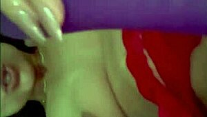 Rossmexicana indulges in solo masturbation with her dildo while wearing those sexy red stockings for ultimate pleasure.