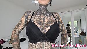 melody radford tries on black and purple lingerie plus micro bikini in this solo haul