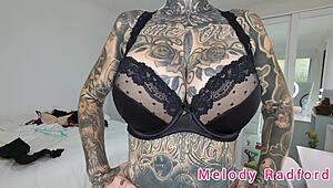 melody radford tries on black and purple lingerie plus micro bikini in this solo haul