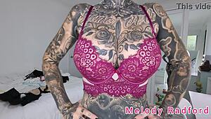 melody radford tries on black and purple lingerie plus micro bikini in this solo haul