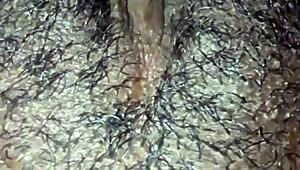 Man, this ebony babe plays with her hairy wet pussy in homemade solo until she orgasms hard.