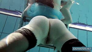 Hey there, check out this hot Hungarian teen 18+ named Petra chilling in the swimming pool with her tight, shaved body on display.