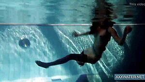 Hey there, check out this hot Hungarian teen 18+ named Petra chilling in the swimming pool with her tight, shaved body on display.