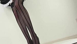 Japanese woman in stockings and heels crushes a hamburger under her feet in fetish food play