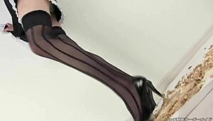 Japanese woman in stockings and heels crushes a hamburger under her feet in fetish food play