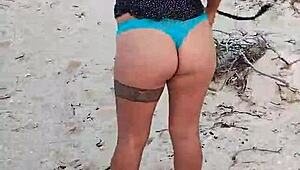 Exhibiting on Mexican beach showing tits and ass in lingerie