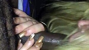 Hey, you think you can handle giving car head like this white girl does to a big black cock?