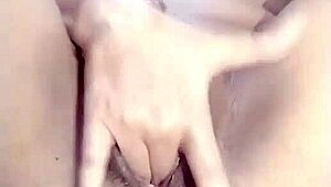 Amateur girl fingers her wet pussy in homemade video until squirting orgasm with dripping clothes ripped off
