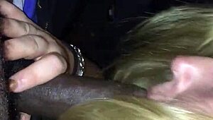 Hey, you think you can handle giving car head like this white girl does to a big black cock?