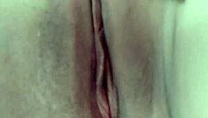 Amateur babe Mary starts with gentle touches on her shaved pussy during webcam solo. She builds to a powerful orgasm.