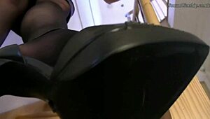 in the office, this bitch knelt down to lick the shoes thoroughly, savoring every moment of submission