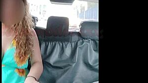 hot photoshoot featuring a busty model with amazing legs inside the taxi