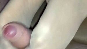 Hey, check out this homemade nylon footjob ending in a messy cumshot on her feet