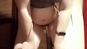 Camgirl in Grey Teases with Sensual Ass Fingering