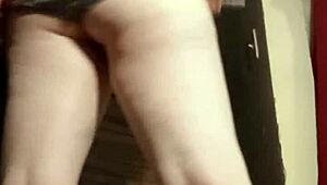 Camgirl in Grey Teases with Sensual Ass Fingering