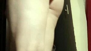 Camgirl in Grey Teases with Sensual Ass Fingering