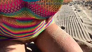 Do you want to see this beautiful blonde milf with big ass and tits on the beach?