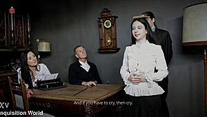 French maid Judith endures spanking and humiliation in her outfit while balancing rule book on head.