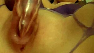 Brunette Chick in Fishnets Toying and Fingering Her Wet Pussy Hole