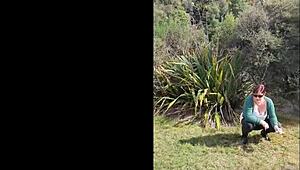 Narrative of trashy Kiwi milf pissing on roadside amid traffic in outdoor public scene