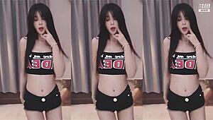 Watch out! This cute Chinese girl with big tits dances wildly, showing off her sexy slim body in an energetic routine.
