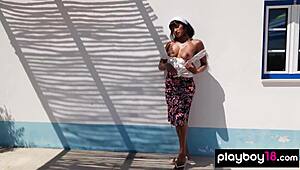 Petite Asian babe Angel Constance undresses outdoors in softcore striptease. She squeezes orange on her natural tits while showing skinny body.