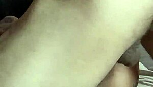 She's giving me this homemade footjob with her sexy feet and pierced nipples, leading to a close-up creampie in our couple's dirty fetish play.