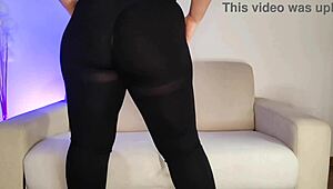 in a homemade setting a curvy brunette with long hair appears as an amateur wearing tight leggings
