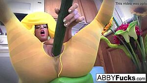 abigail gets creative in the kitchen with her giant cucumber during surreal dress up