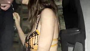 Risky sex unfolds in the hotel parking lot with muffled moans