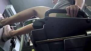 in the gym locker room, a horny teen beauty massages her shaved pussy on the bench until she squirts everywhere