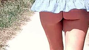 Boldly stripping naked on the busy street for public thrill