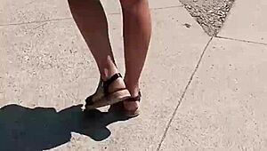 Boldly stripping naked on the busy street for public thrill