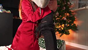 Cute redhead teen moans during rough doggystyle fucking under the christmas tree in quickie session