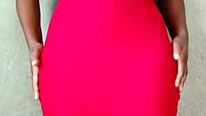 This sexy African lady teases by revealing her alluring tits