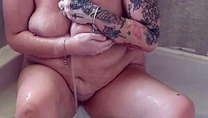 i love soaking in the tub, rubbing my big tits and shaved pussy as a mature milf slut