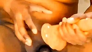 This athletic ebony shemale with a small cock strips down at home, teasing in see-through clothes before riding a dildo.