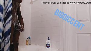 Guy strokes big dick in shower off the clock