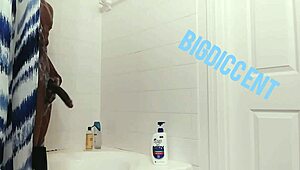 Guy strokes big dick in shower off the clock