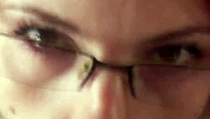 glasses-wearing karla rose kneels in pov locking eyes as she sucks my wrapped cock hungrily